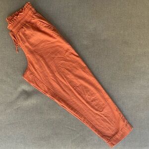 A New Day brand pant, coral color, high rise, elastic waist size small.